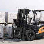 Forklift next to pallets